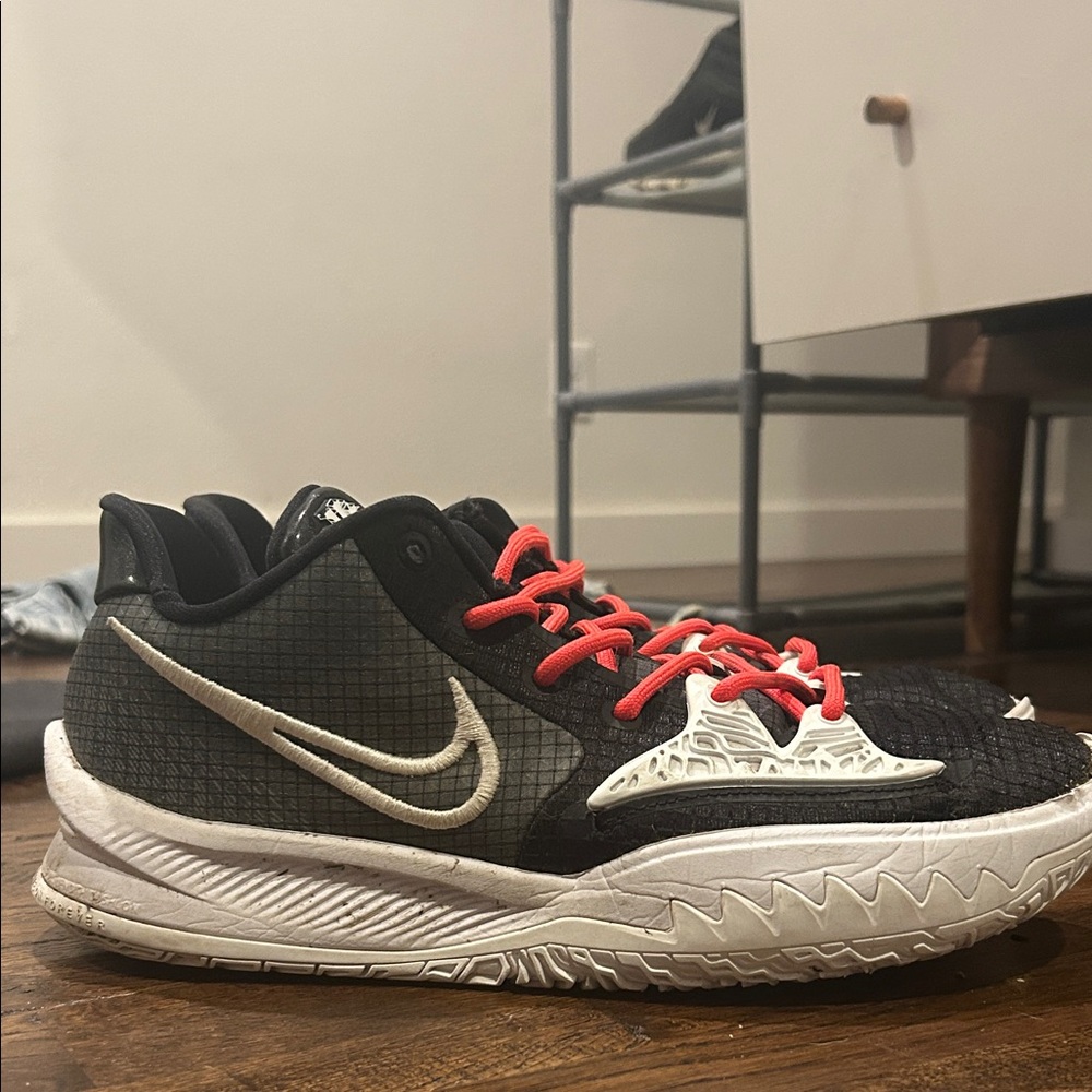 Nike Black and White Athletic Shoes with Red Accents